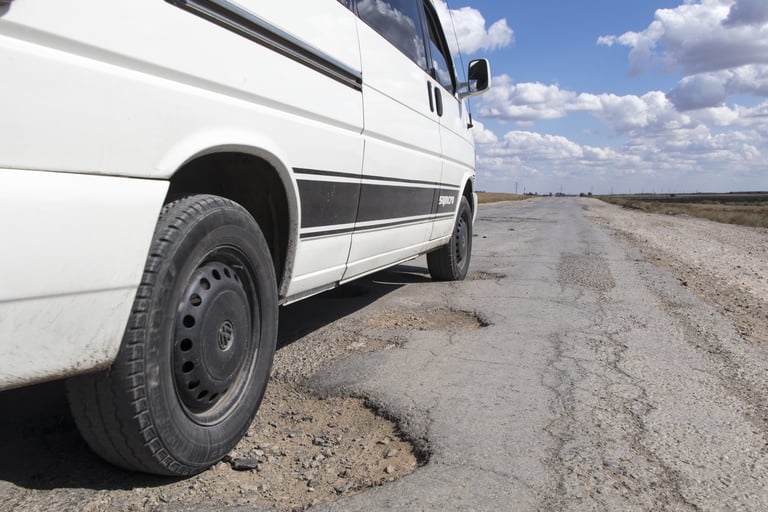 Your Vehicle’s Worst Enemy: Potholes