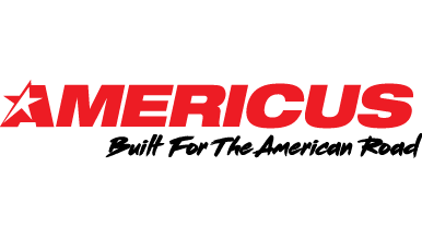 Logo with the word "Americus" in bold red letters featuring a star, and the phrase "Built For The American Road" below in black script.